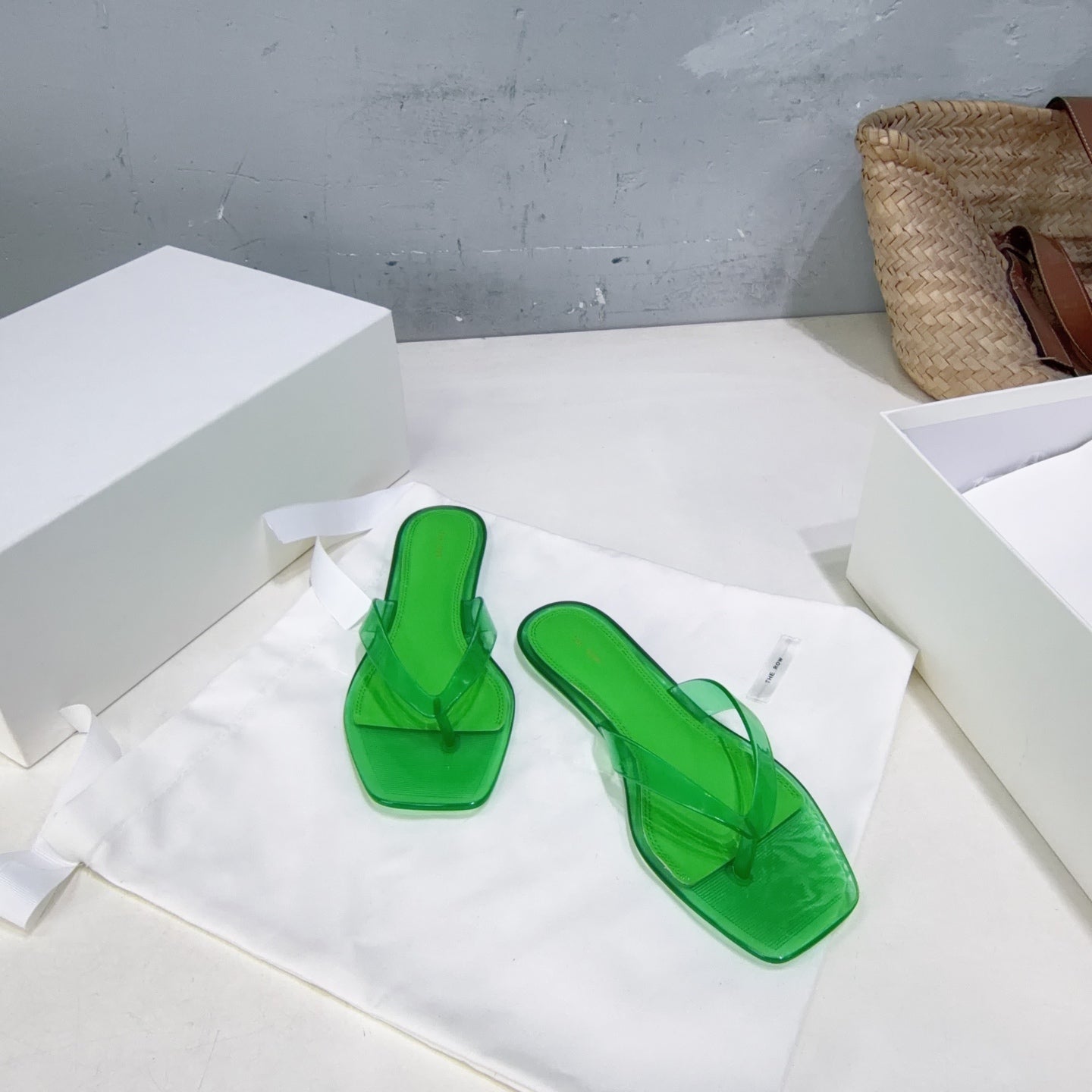 THE ROW 26S SQUARE TOE THONG SANDALS IN TRANSLUCENT GREEN PVC WITH SILVER FOOTBED