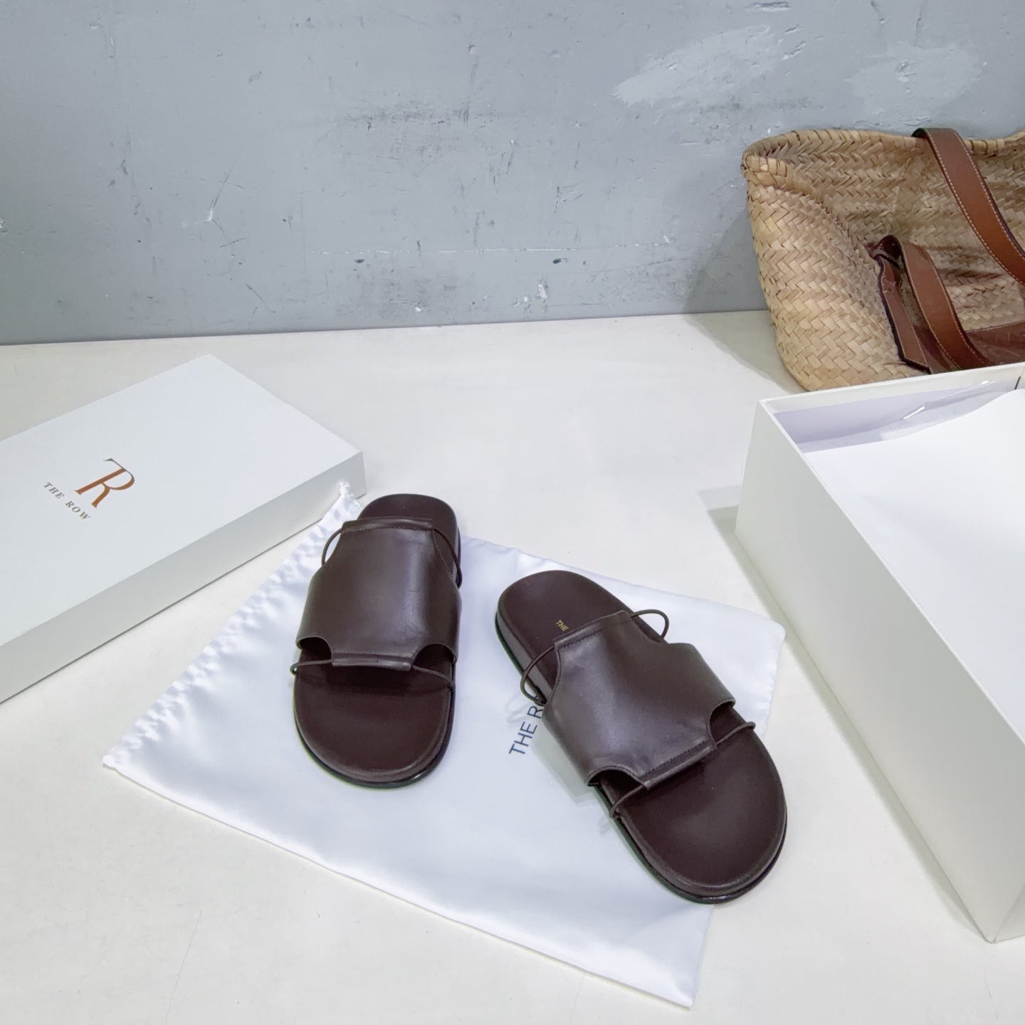 THE ROW 26S STRAP SLIDES IN CHOCOLATE BROWN CALFSKIN