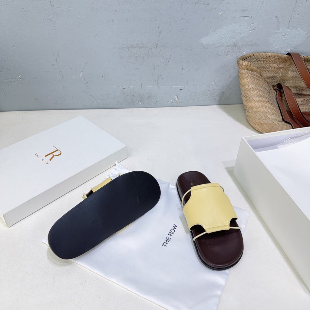 THE ROW 26S STRAP SLIDES IN LIGHT YELLOW CALFSKIN