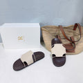 THE ROW 26S STRAP SLIDES IN BEIGE CALFSKIN