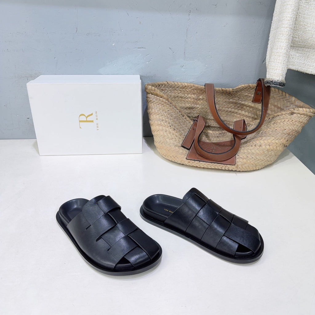 THE ROW 26S CAGE SLIDES IN BLACK SMOOTH CALFSKIN