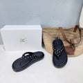 THE ROW 26S THONG SANDALS IN BLACK CALFSKIN & POLKA DOT CALF HAIR STRAPS