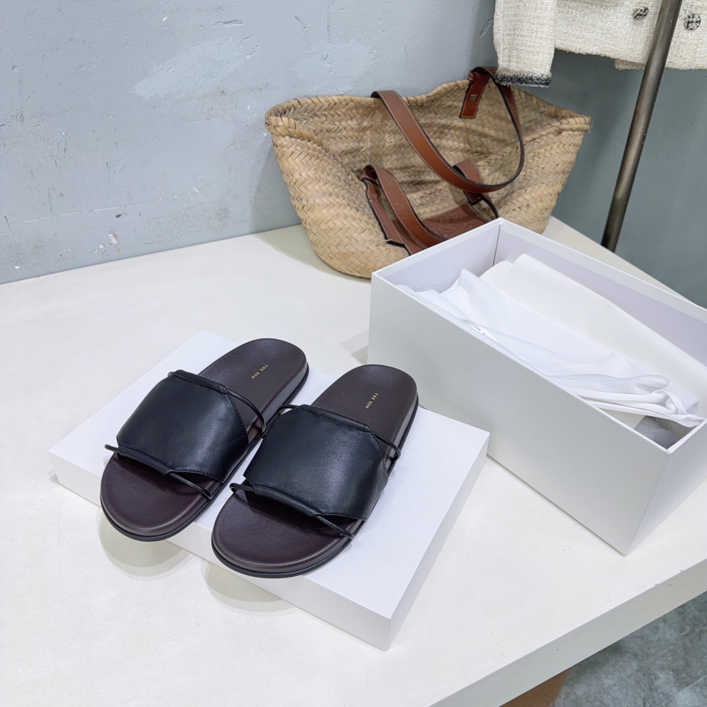 THE ROW 26S STRAP SLIDES IN BLACK CALFSKIN
