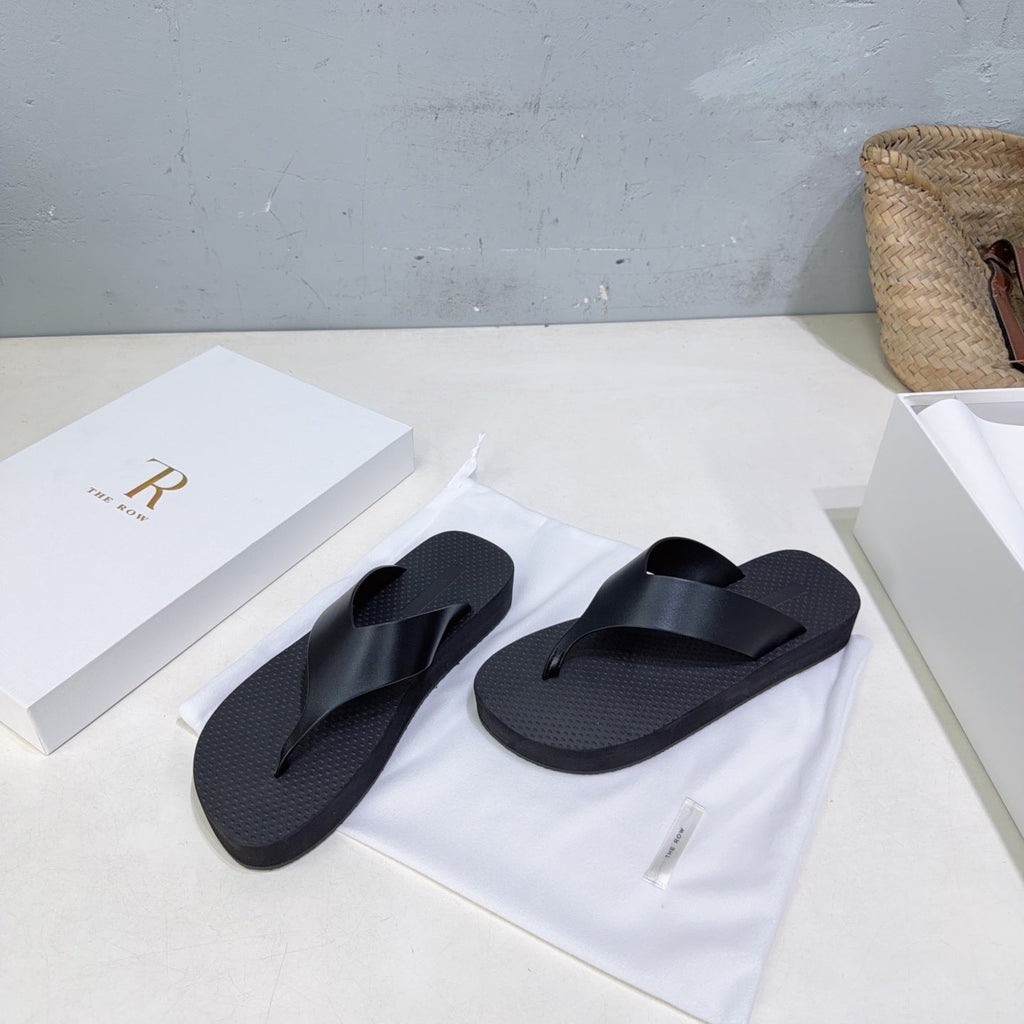 THE ROW 26S THONG SANDALS IN BLACK RUBBER AND CALFSKIN
