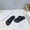 THE ROW 26S THONG SANDALS IN BLACK RUBBER AND CALFSKIN