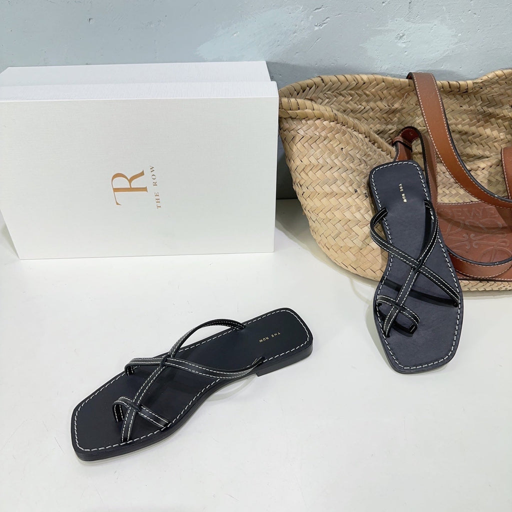 THE ROW 26S FLAT SANDALS IN BLACK CALFSKIN