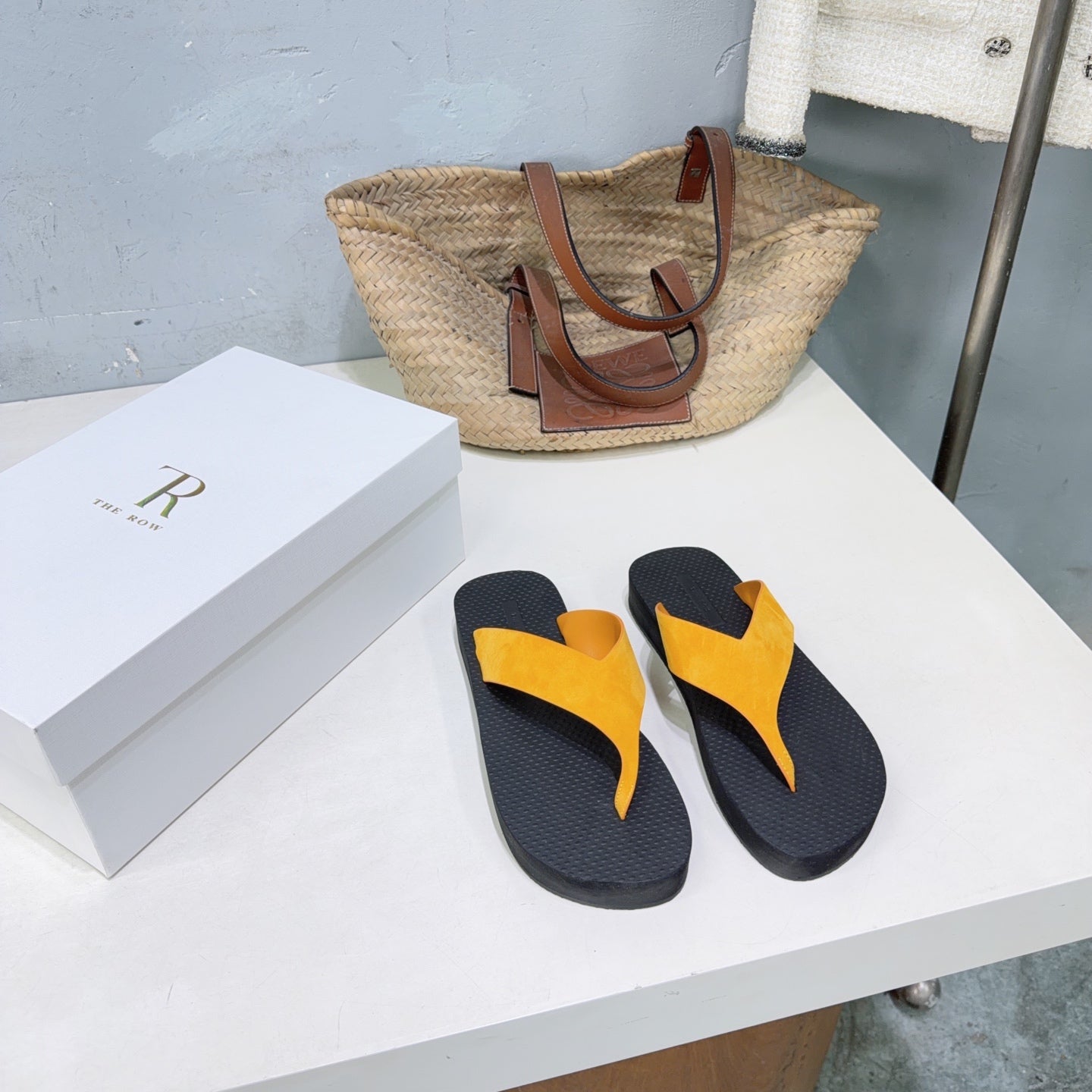 THE ROW 26S THONG SANDALS IN BLACK RUBBER  WITH GOLD YELLOW STRAPS