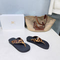 THE ROW 26S THONG SANDALS IN BLACK RUBBER WITH LEOPARD CALF HAIR STRAPS
