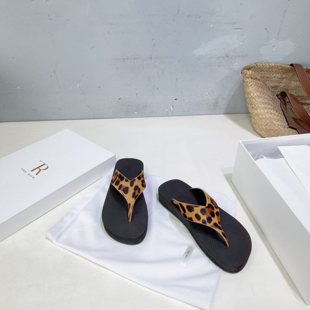 THE ROW 26S THONG SANDALS IN BLACK RUBBER WITH LEOPARD CALF HAIR STRAPS