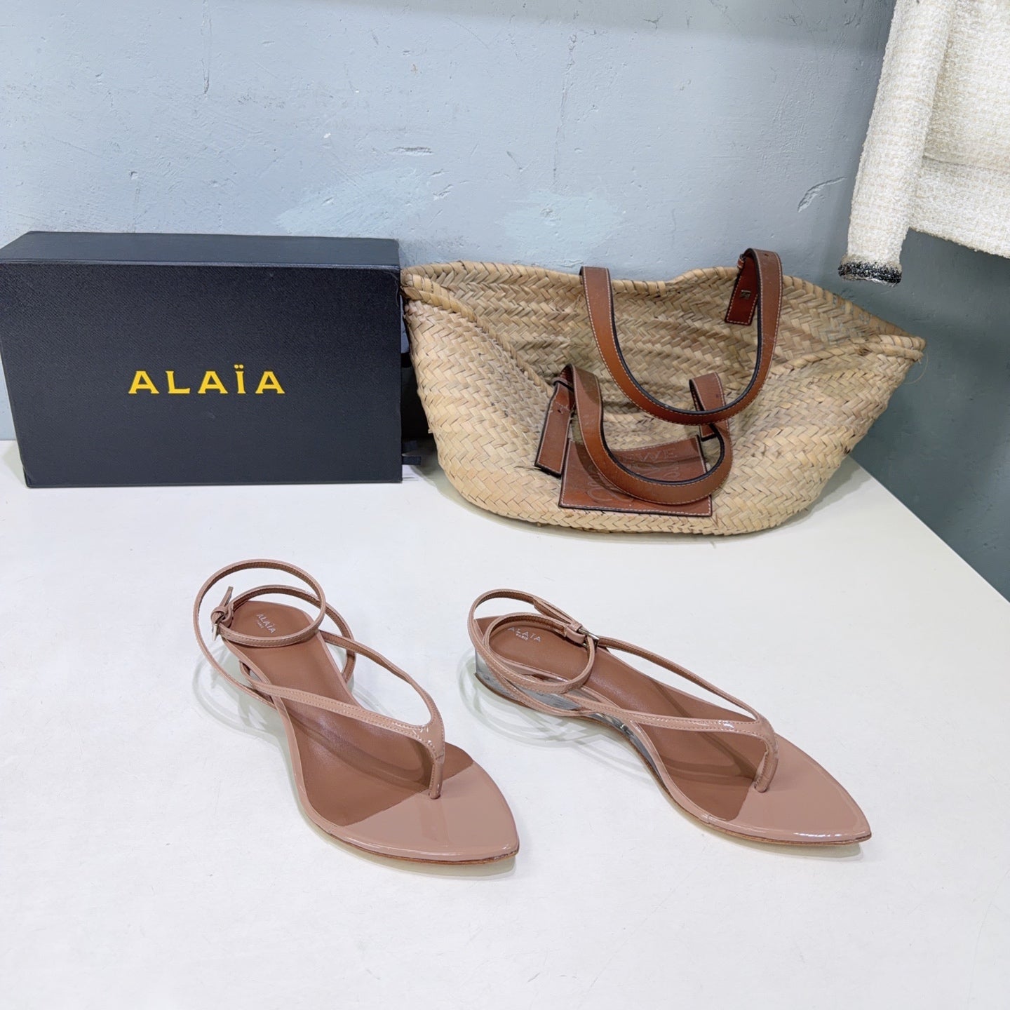ALAIA 26S THONG SANDALS IN NUDE CALFSKIN