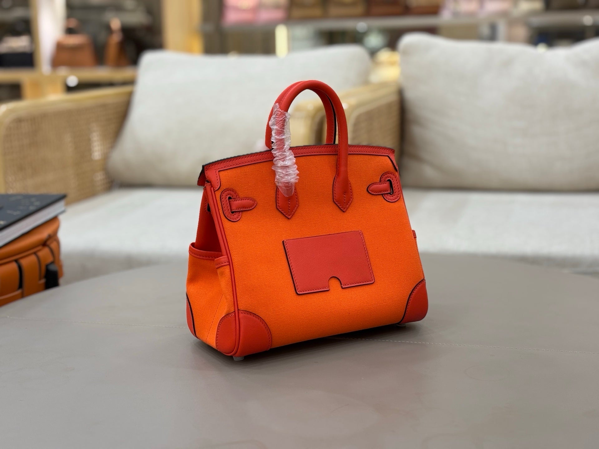 HM 25S BIRKIN CARGO 25 CM IN DARK ORANGE CANVAS AND SWIFT WITH SILVER HARDWARE