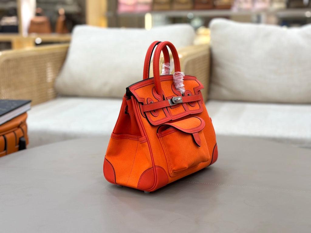 HM 25S BIRKIN CARGO 25 CM IN DARK ORANGE CANVAS AND SWIFT WITH SILVER HARDWARE