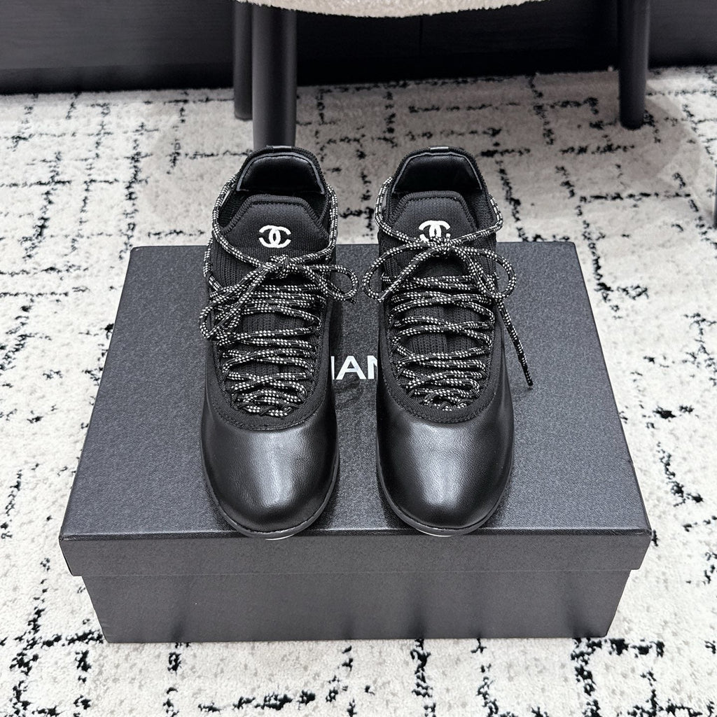 CHANEL 26S LACE-UP SNEAKERS IN BLACK FABRIC AND LAMBSKIN