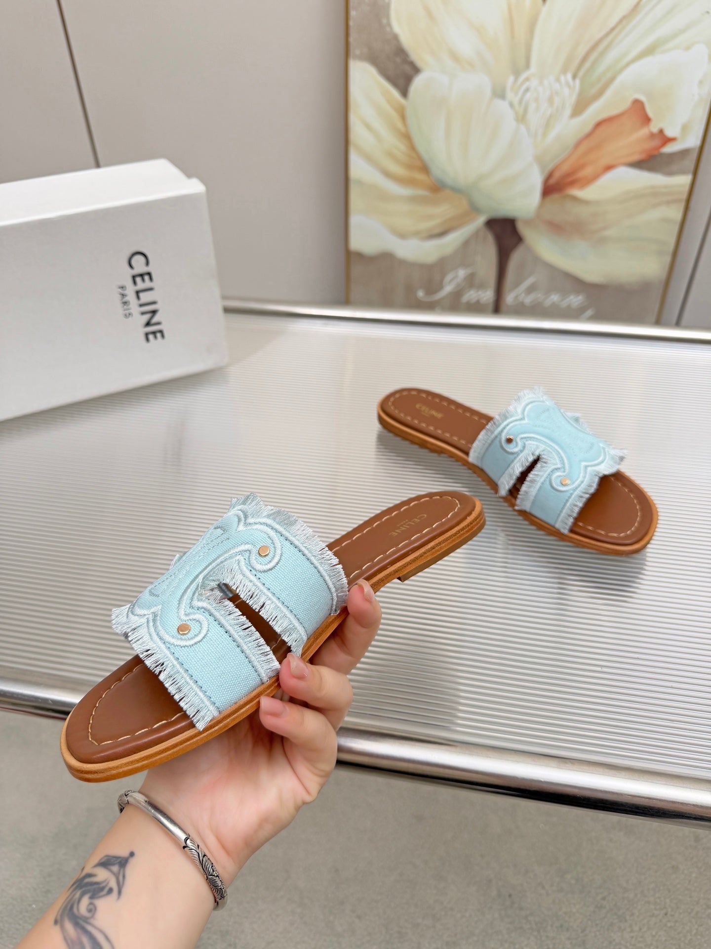 CELINE 26S TRIOMPHE SLIDE SANDALS IN SKY BLUE CANVAS