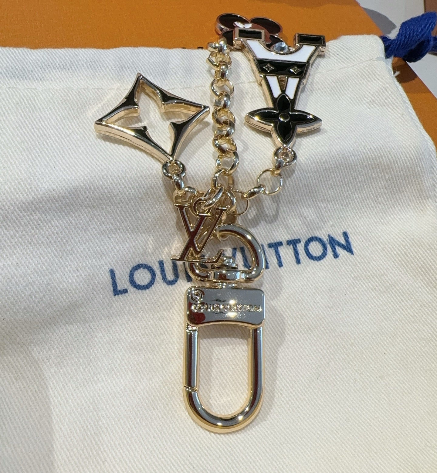 LV MULTI GOLD BAG CHARM FEATURING ENAMEL