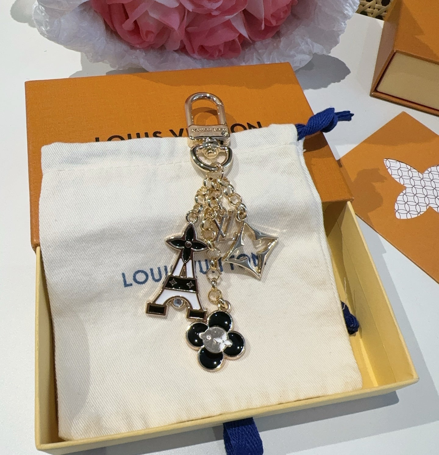 LV MULTI GOLD BAG CHARM FEATURING ENAMEL