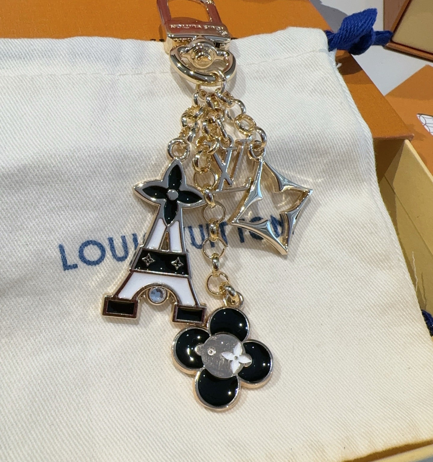 LV MULTI GOLD BAG CHARM FEATURING ENAMEL