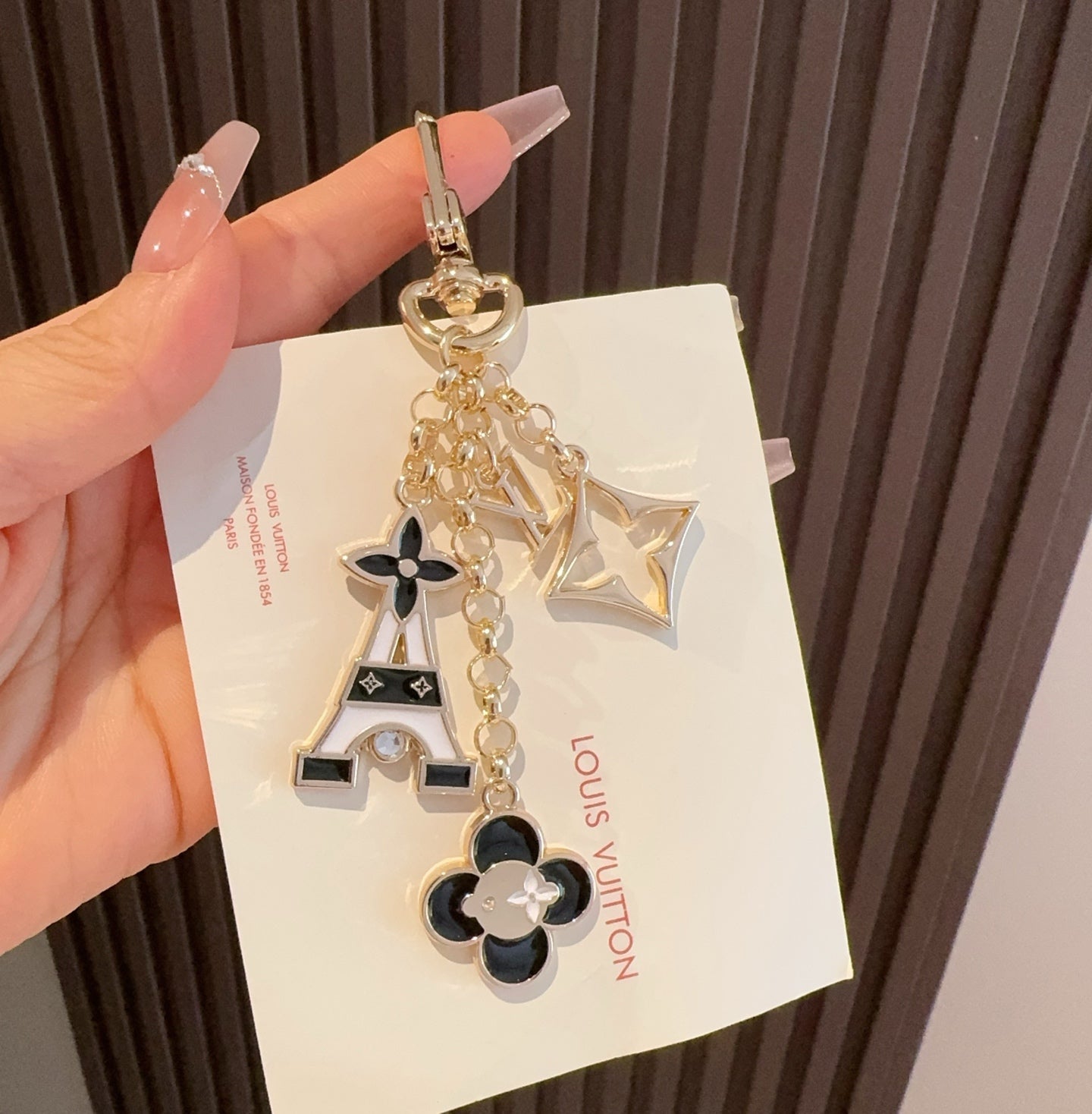 LV MULTI GOLD BAG CHARM FEATURING ENAMEL
