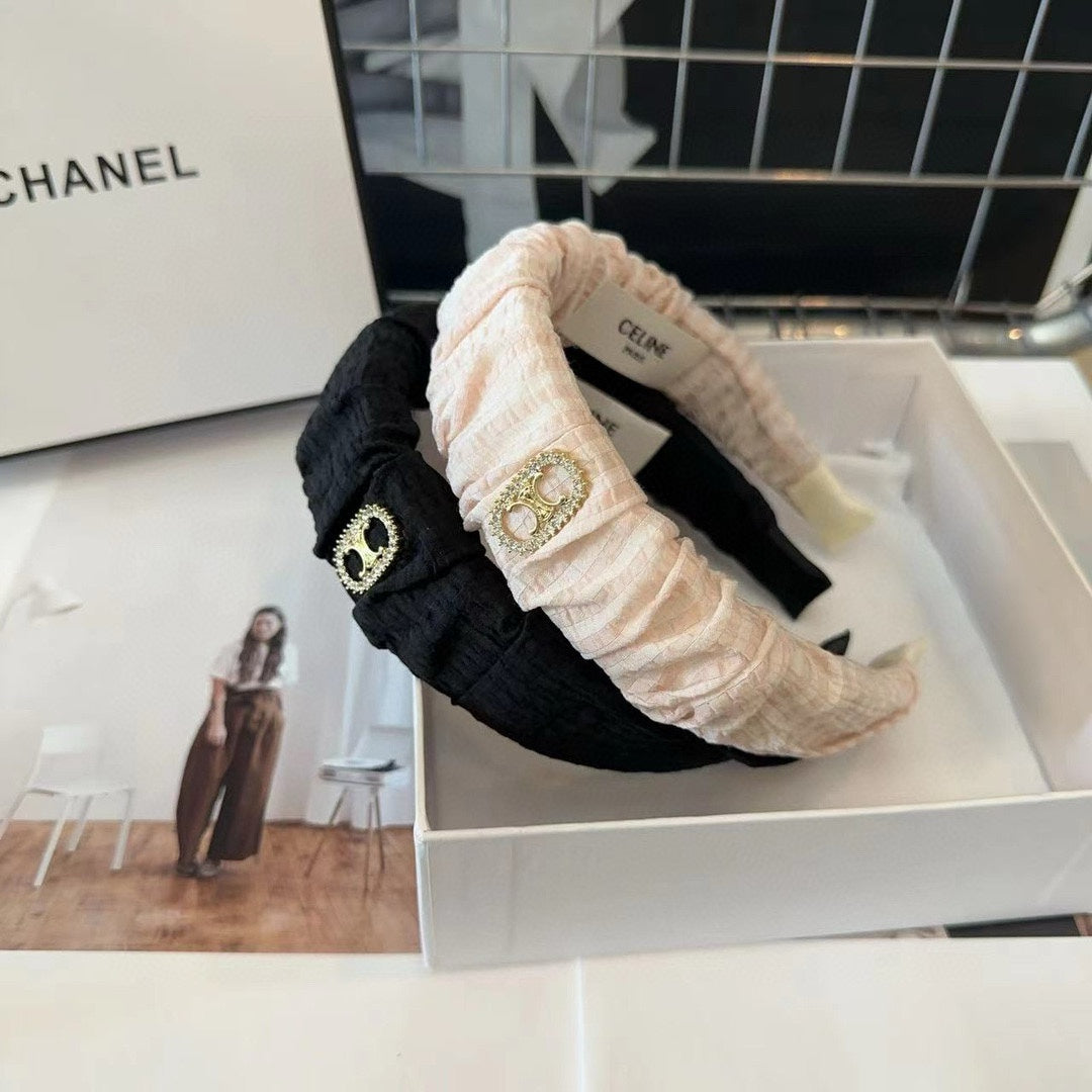 BLACK FABRIC WITH GOLD LOGO HAIRBAND 414448