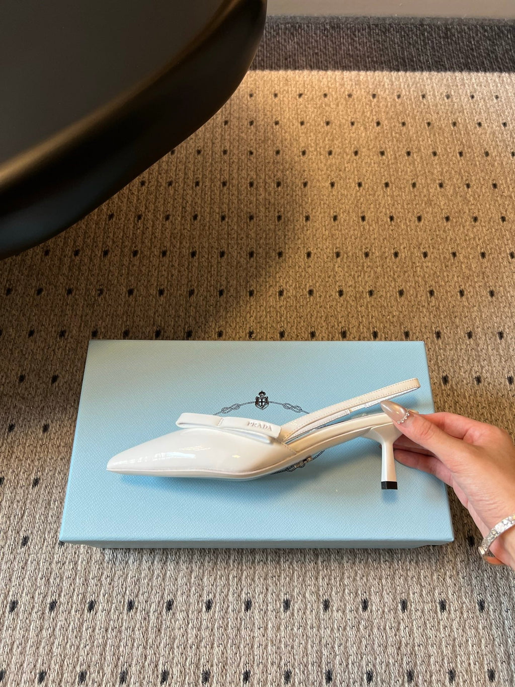 PRADA 26S BOW DETAIL SLINGBACK PUMPS 55MM IN WHITE PATENT CALFSKIN