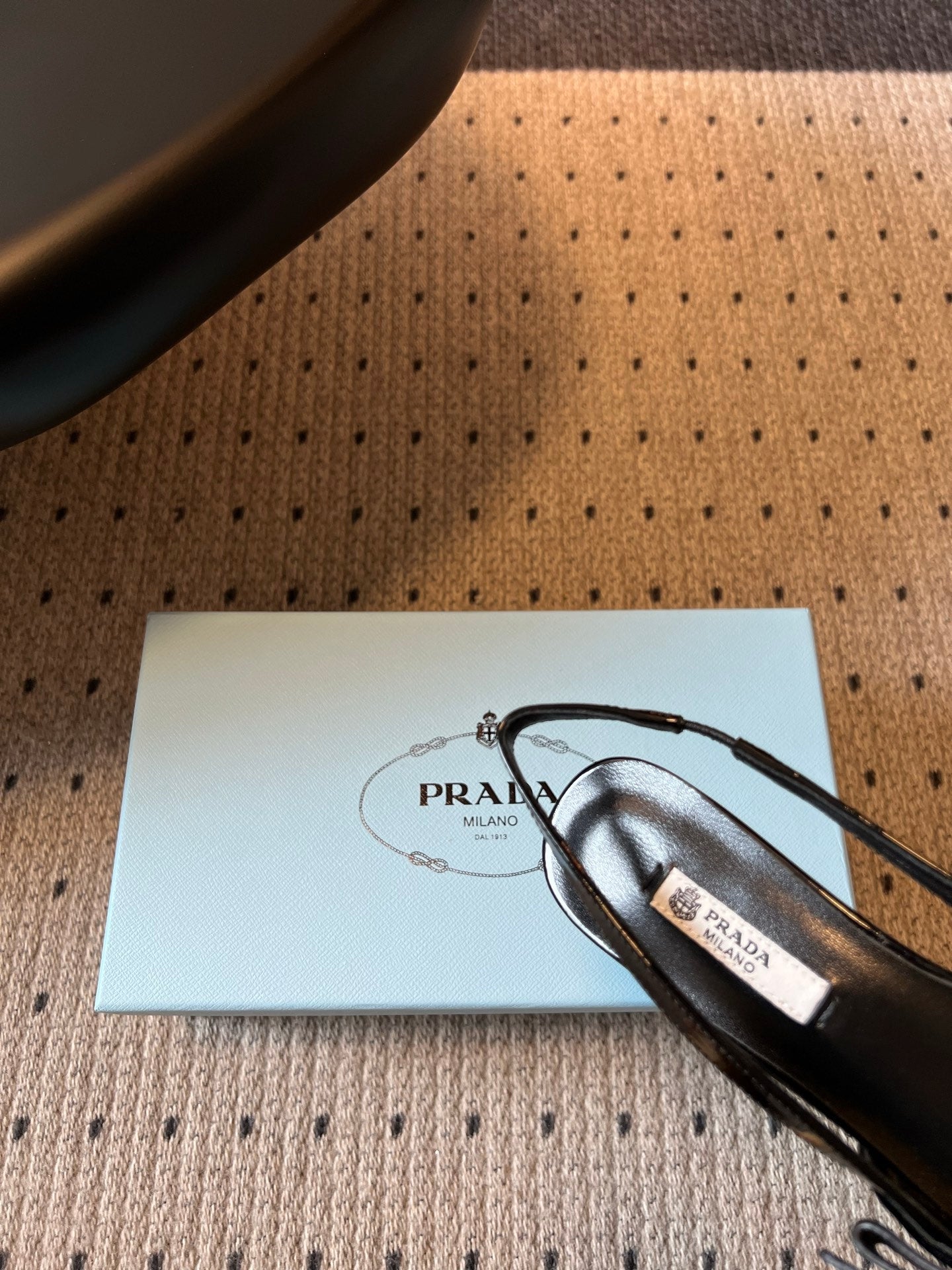 PRADA 26S BOW DETAIL SLINGBACK PUMPS 55MM IN BLACK PATENT CALFSKIN