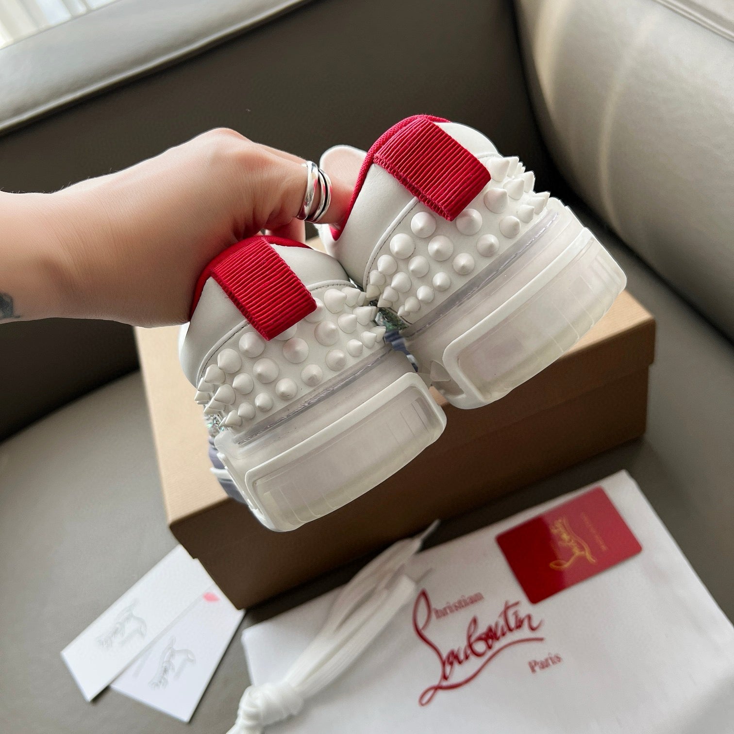 ASTROLOUBI SNEAKER IN WHITE AND GREY CALFSKIN WHITE SPIKES RHINESTONE DETAILS