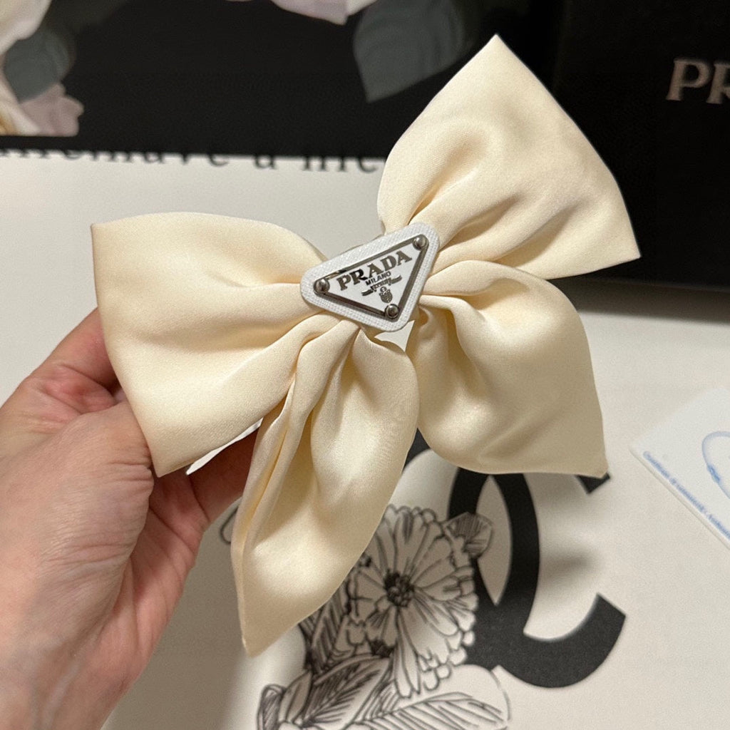 BOW-KNOT HAIR CLIP IN EGG SHELL SILK 358294