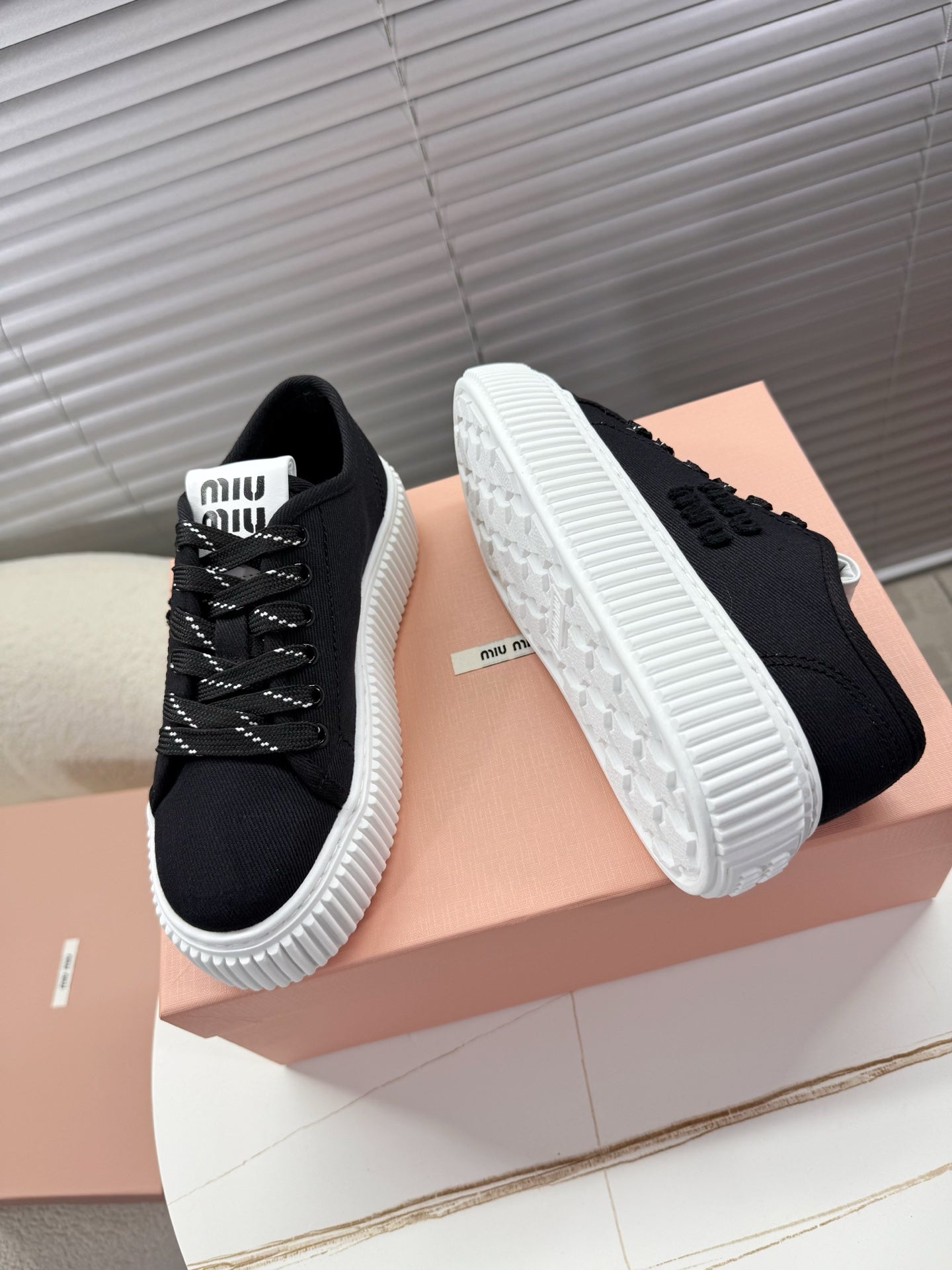 MIUMIU 26S PLATFORM SNEAKERS IN BLACK CANVAS