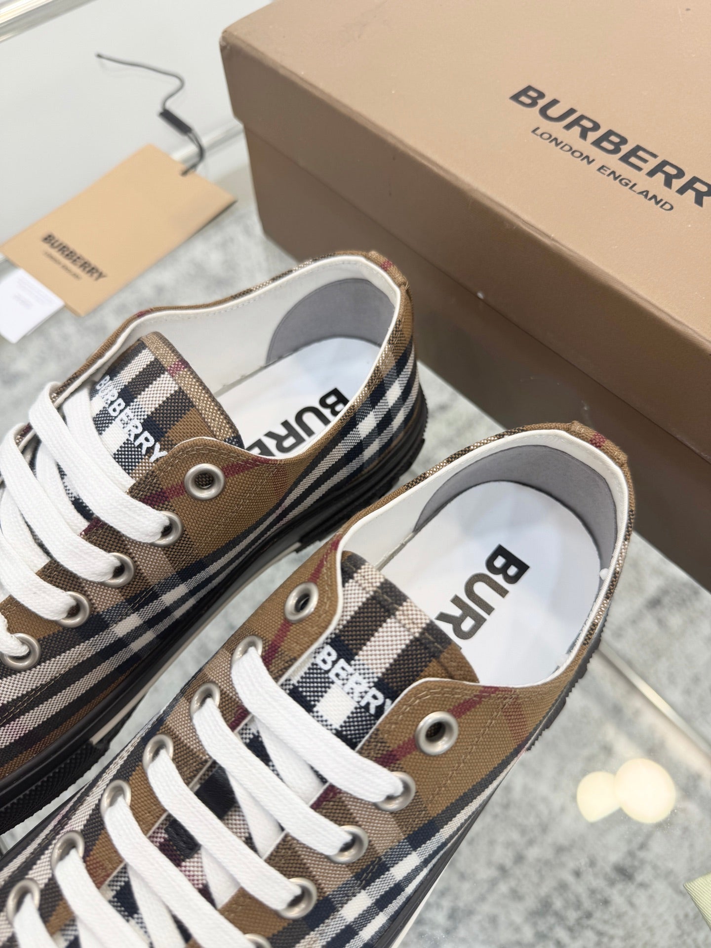 BURBERRY 26S VINTAGE CHECK LOW TOP SNEAKERS IN BLACK AND BROWN CANVAS
