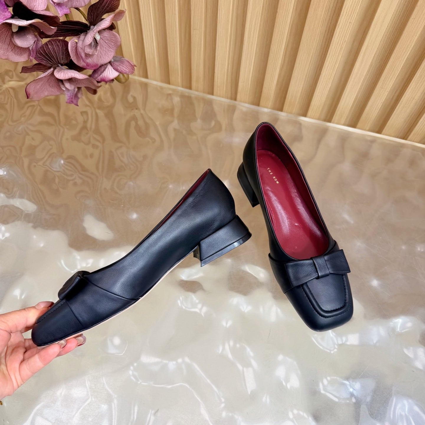 THE ROW 26S SQUARE TOE PUMPS IN BLACK CALFSKIN WITH BOW