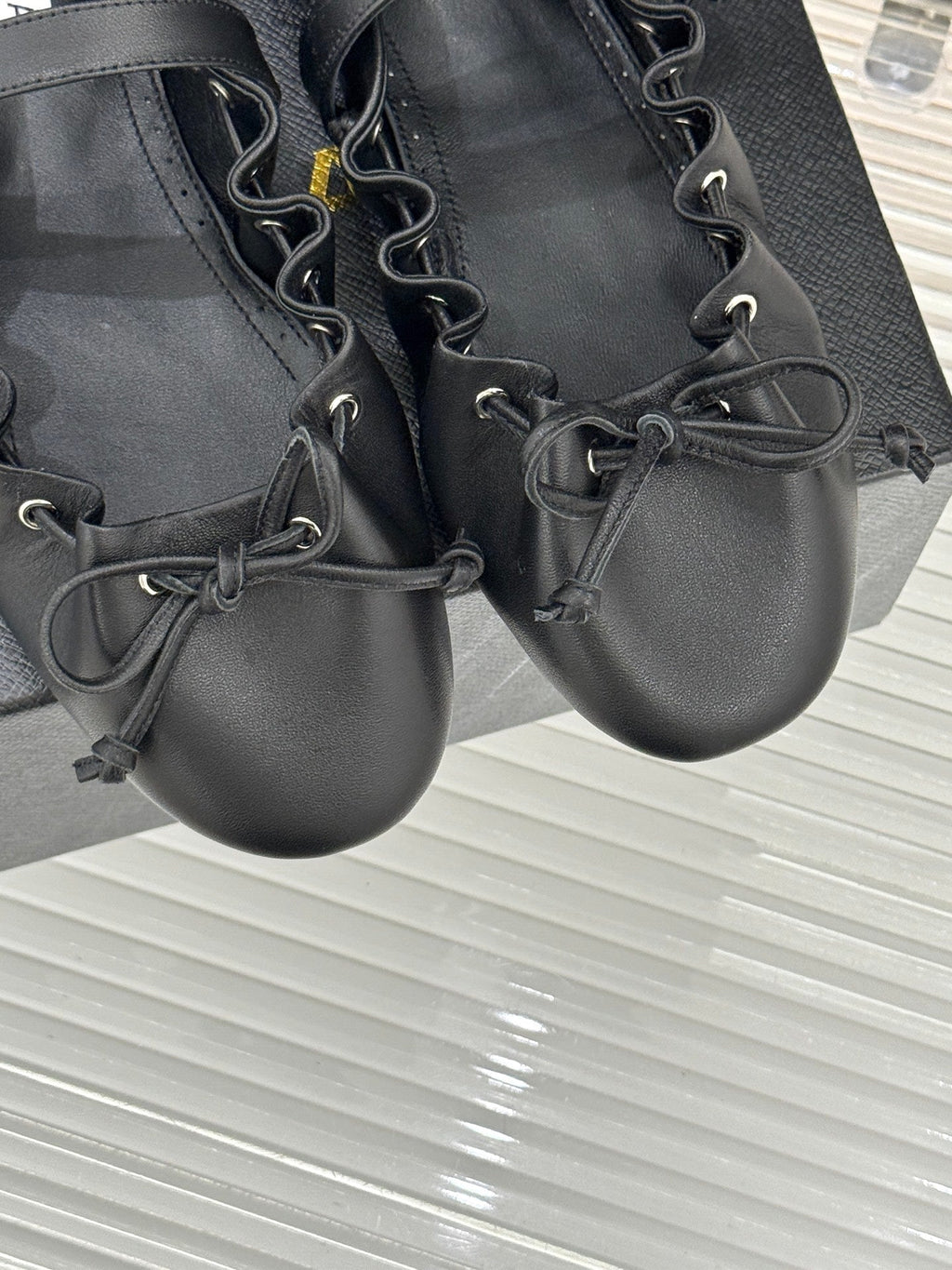 ALAIA 26S MARY JANE FLATS IN BLACK LAMBSKIN WITH BOW