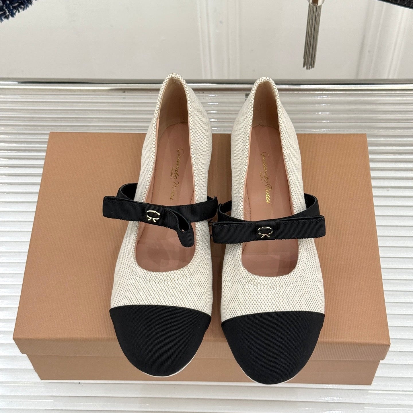 GIANVITO ROSSI 26S MARY JANE FLATS IN BLACK AND WHITE FABRIC
