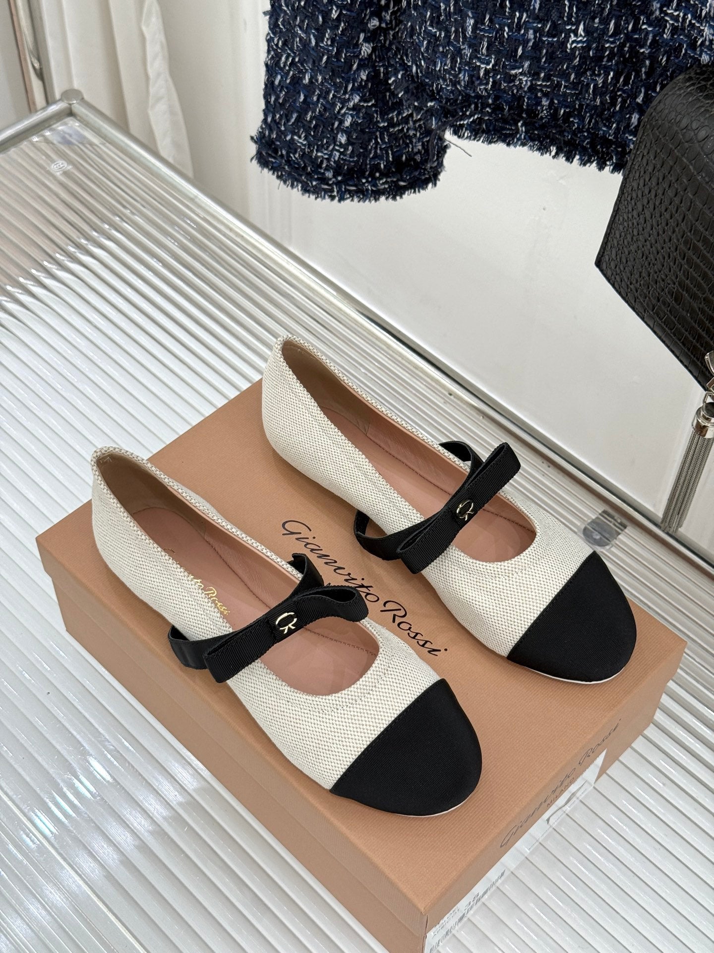 GIANVITO ROSSI 26S MARY JANE FLATS IN BLACK AND WHITE FABRIC