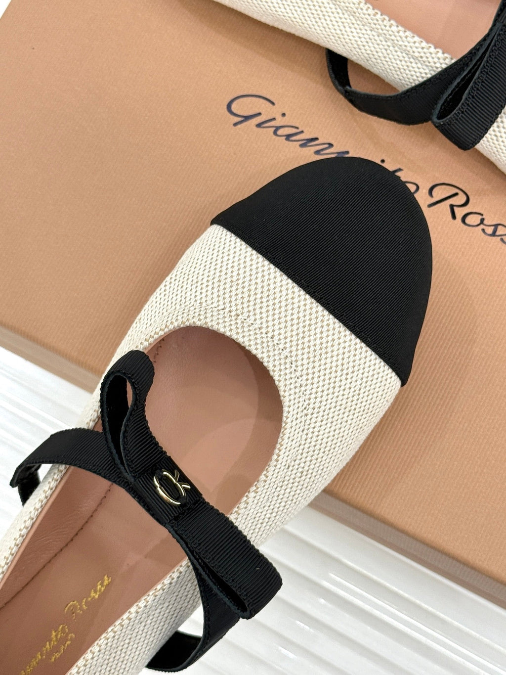 GIANVITO ROSSI 26S MARY JANE FLATS IN BLACK AND WHITE FABRIC