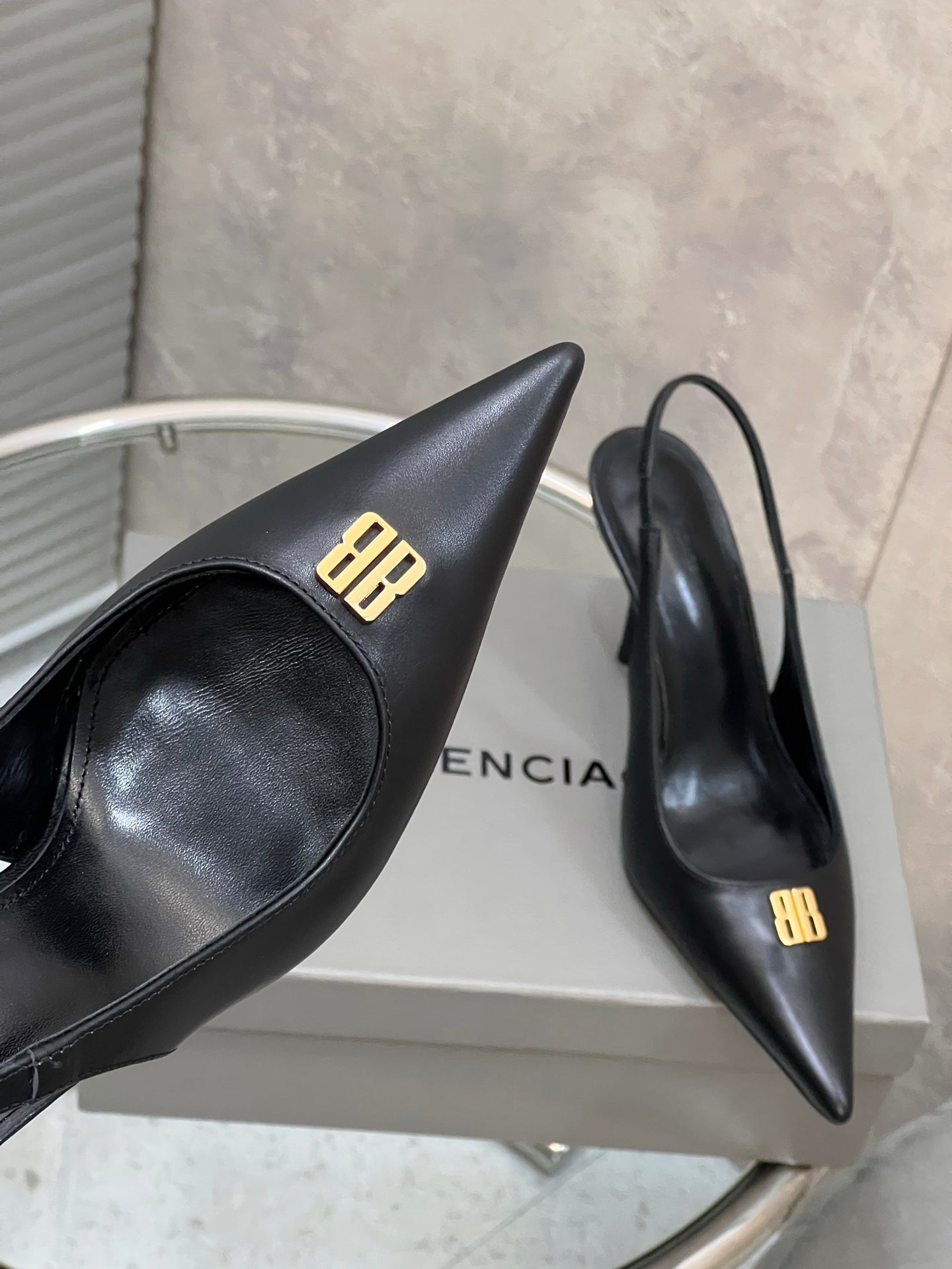 BALENCIAGA 25S HIGH-HEEL SLINGBACK 85 MM IN BLACK COW LEATHER WITH GOLD HARDWARE