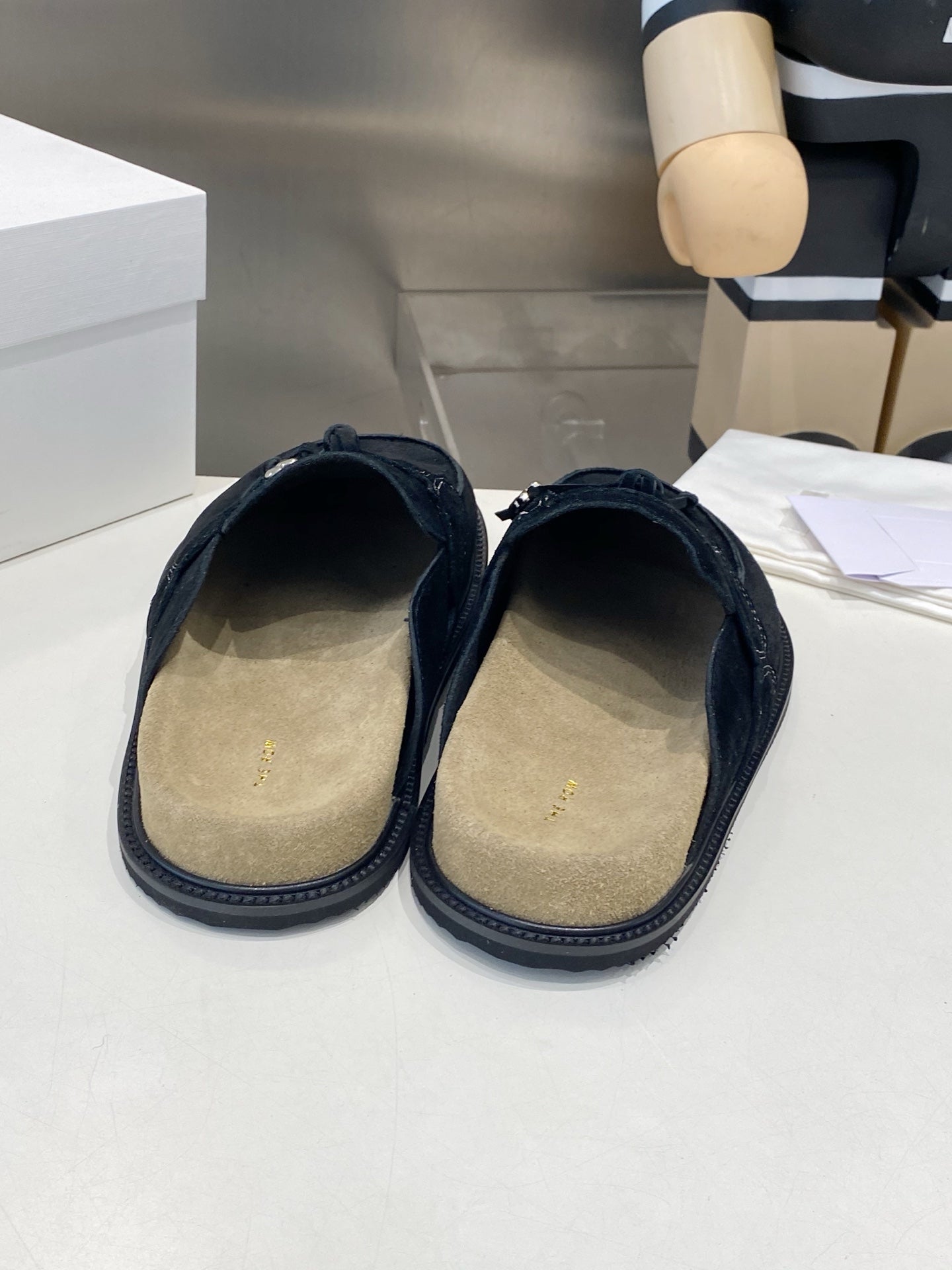 THE ROW 26S KNOT DETAIL MULE LOAFERS IN BLACK SUEDE