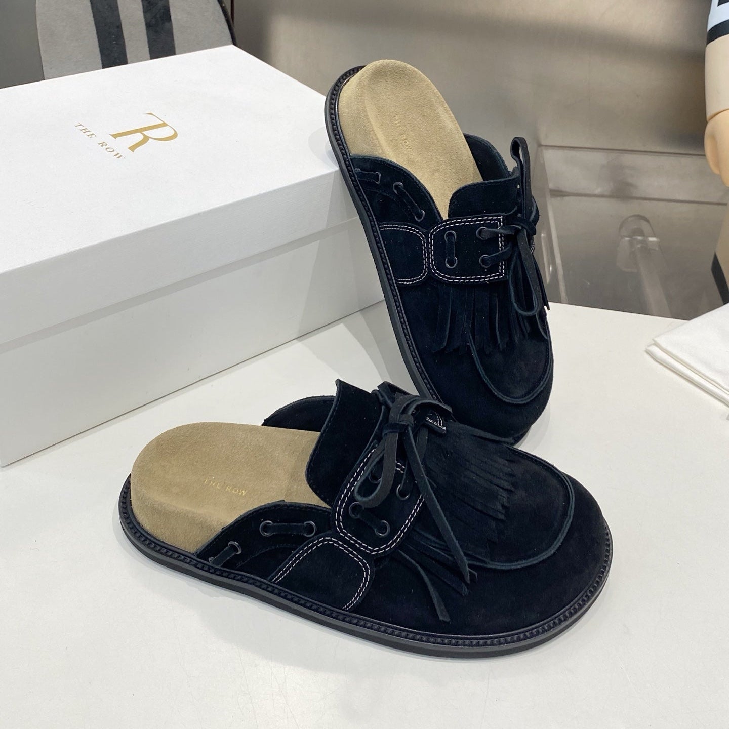 THE ROW 26S FRINGE LACE UP MULES IN BLACK SUEDE