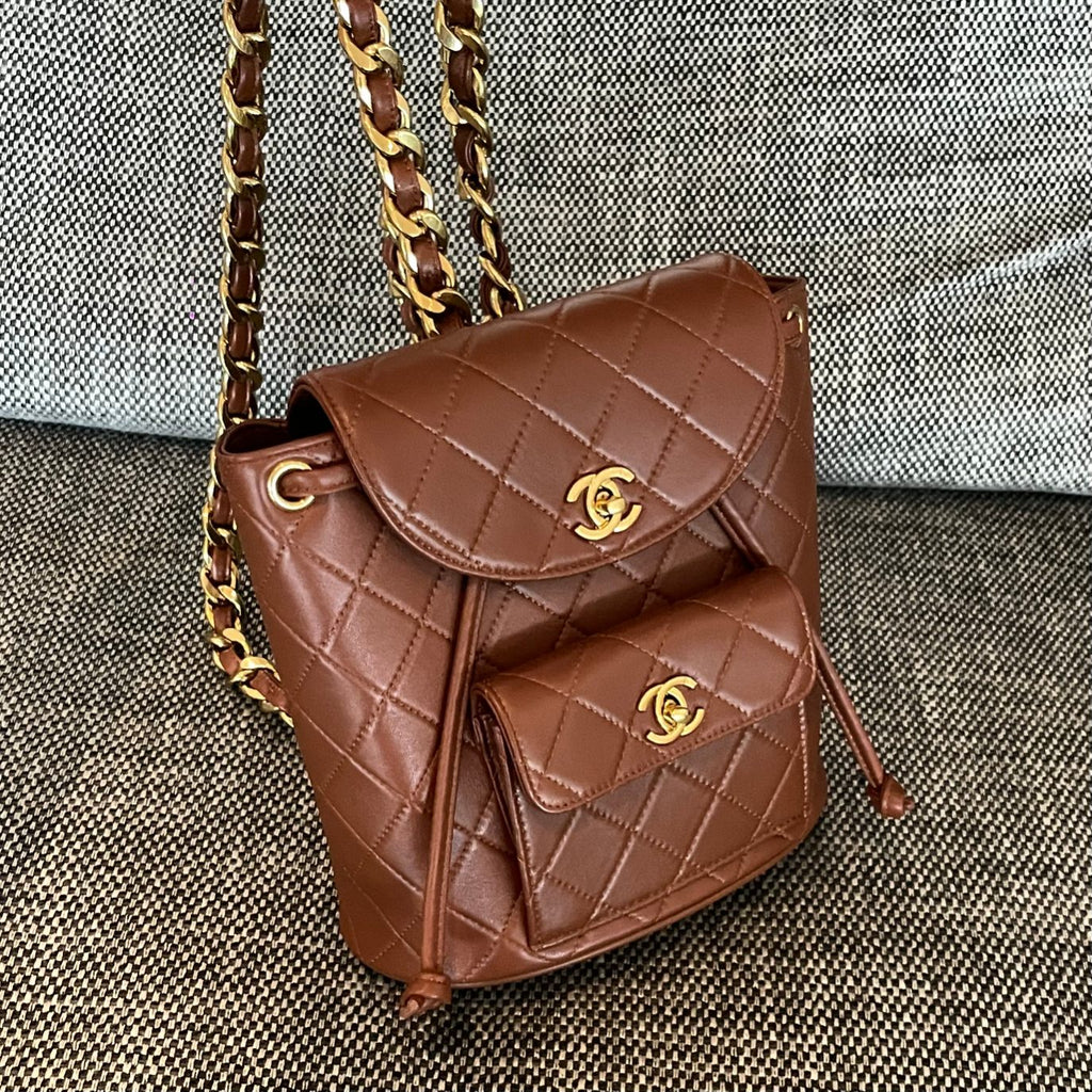 CHANEL 26S BACKPACK WITH FRONT POCKET 21 IN BROWN QUILTED LAMBSKIN GOLD HARDWARE