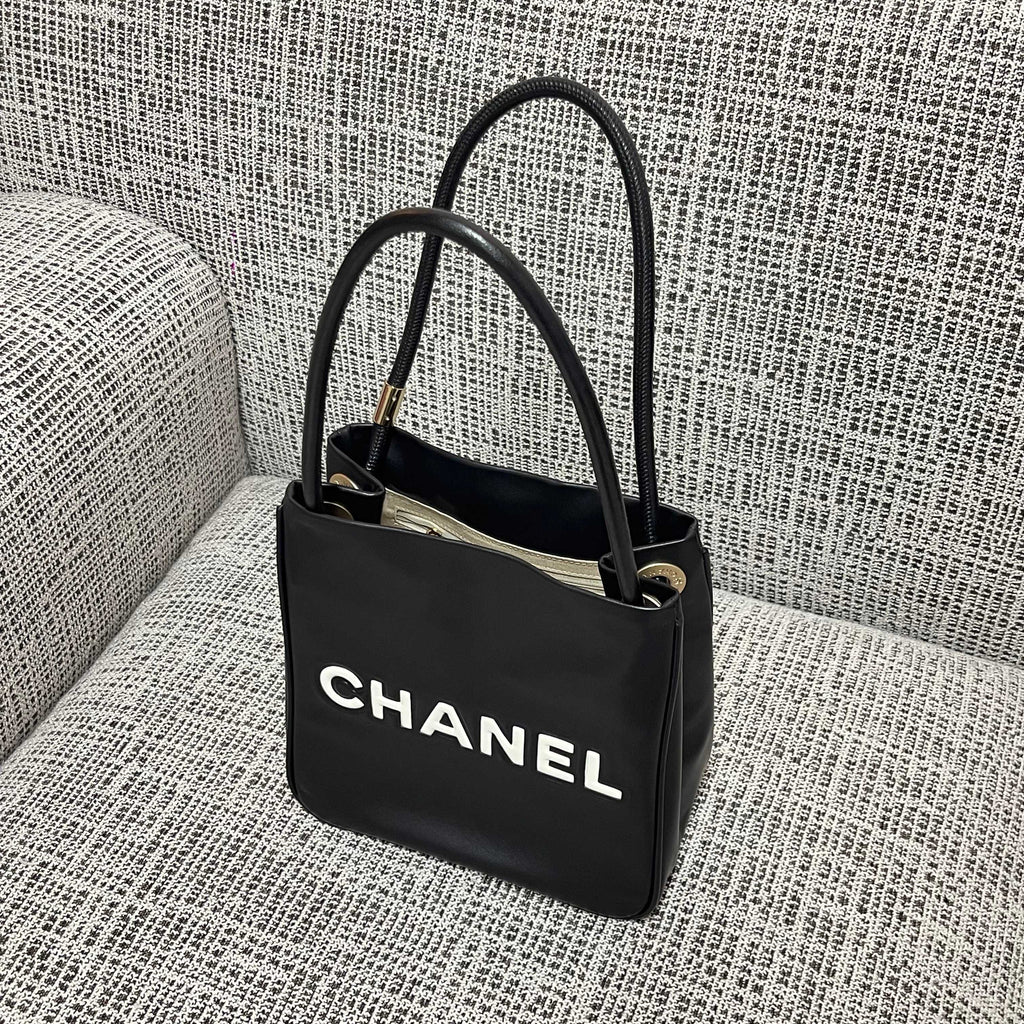 CHANEL 26S LOGO SHOPPING TOTE BAG 25 IN BLACK AND WHITE CALFSKIN GOLD HARDWARE