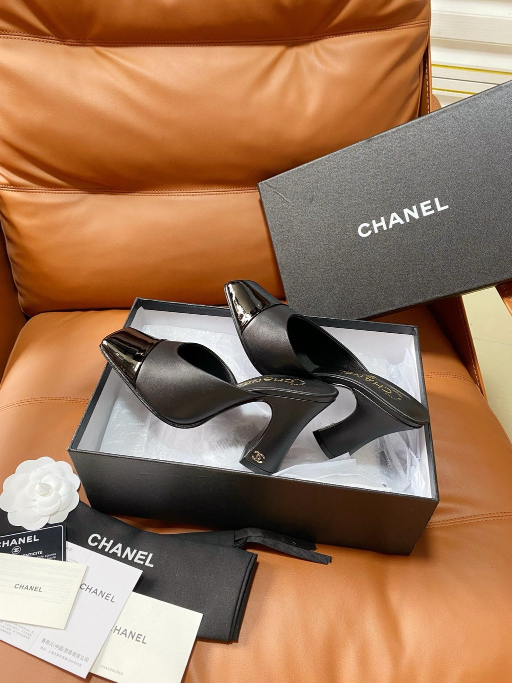 CHANEL 26S HIGH-HEEL MULES 90 MM IN BLACK LAMBSKIN