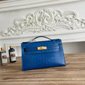 HM 25S KELLY MINI 22 CM IN COBALT BLUE LAMBSKIN WITH CROCODILE EMBOSSING AND GOLD HARDWARE