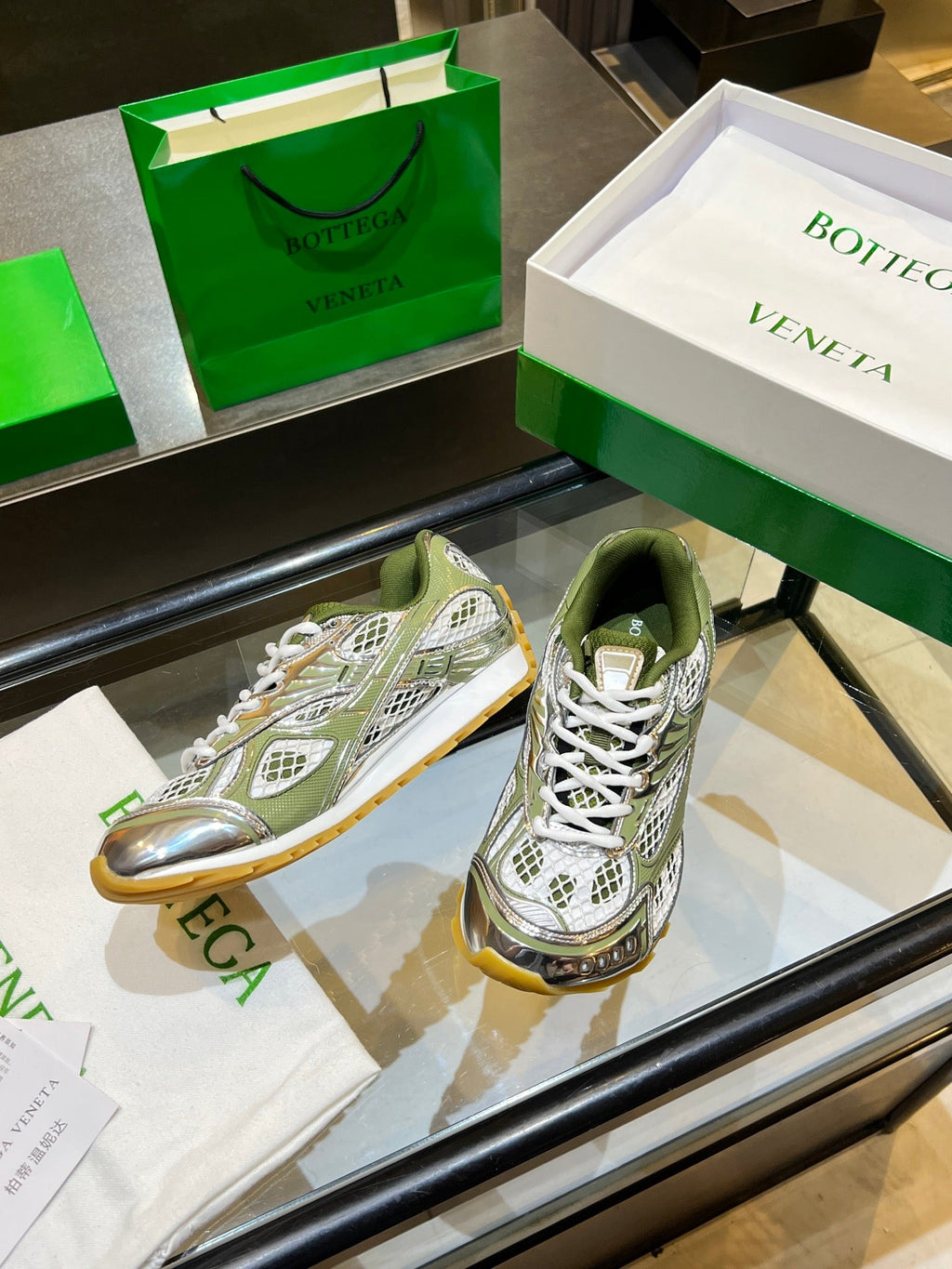 BOTTEGA VENETA 26S ORBIT SNEAKERS IN SILVER AND MOSS GREEN TECHNICAL MESH