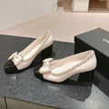 BOWKNOT HIGH HEELS IN WHITE MIX BLACK SHEEPSKIN