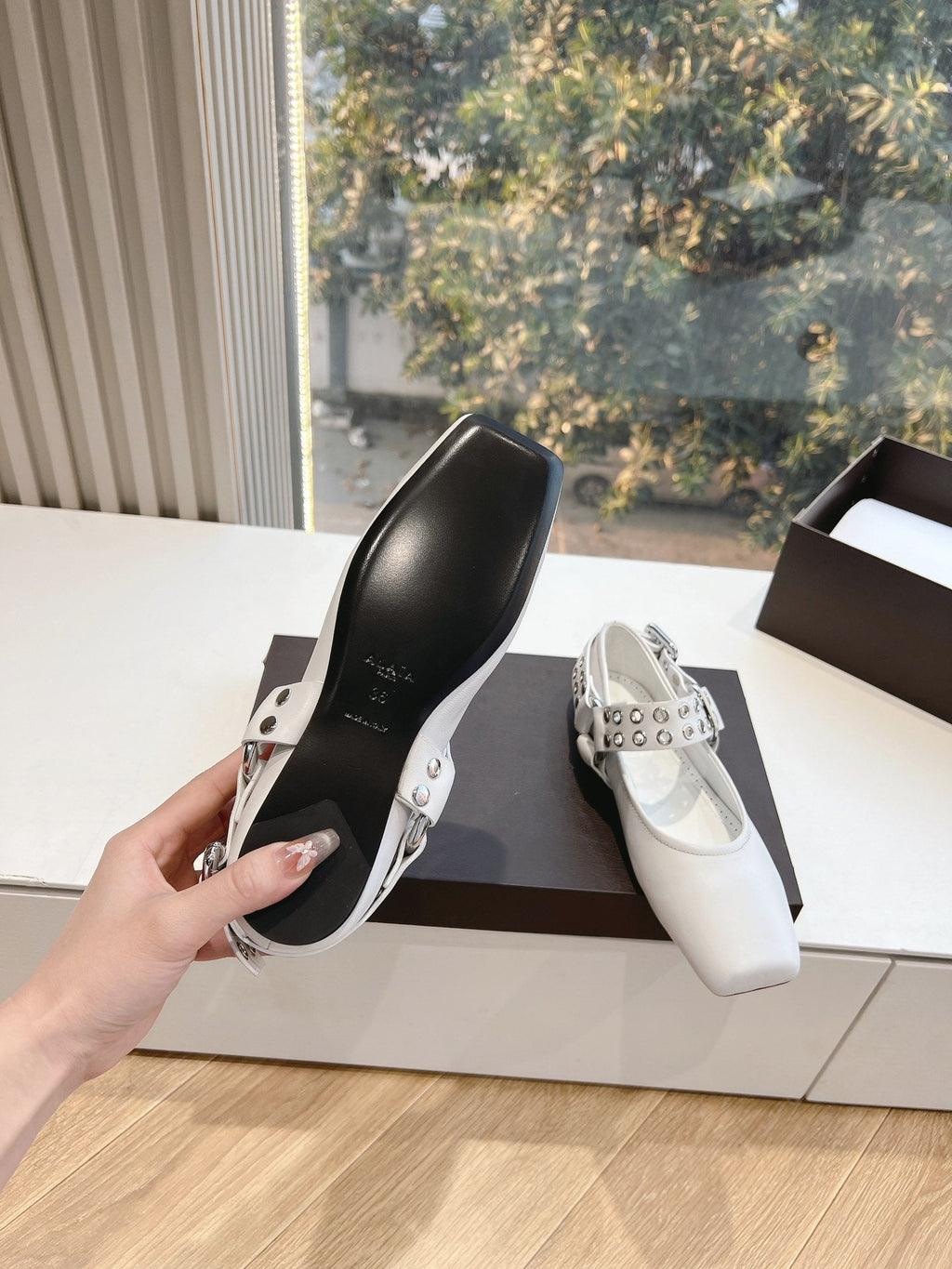 ALAIA 26S FLATS IN WHITE CALFSKIN WITH SILVER STUD STRAP