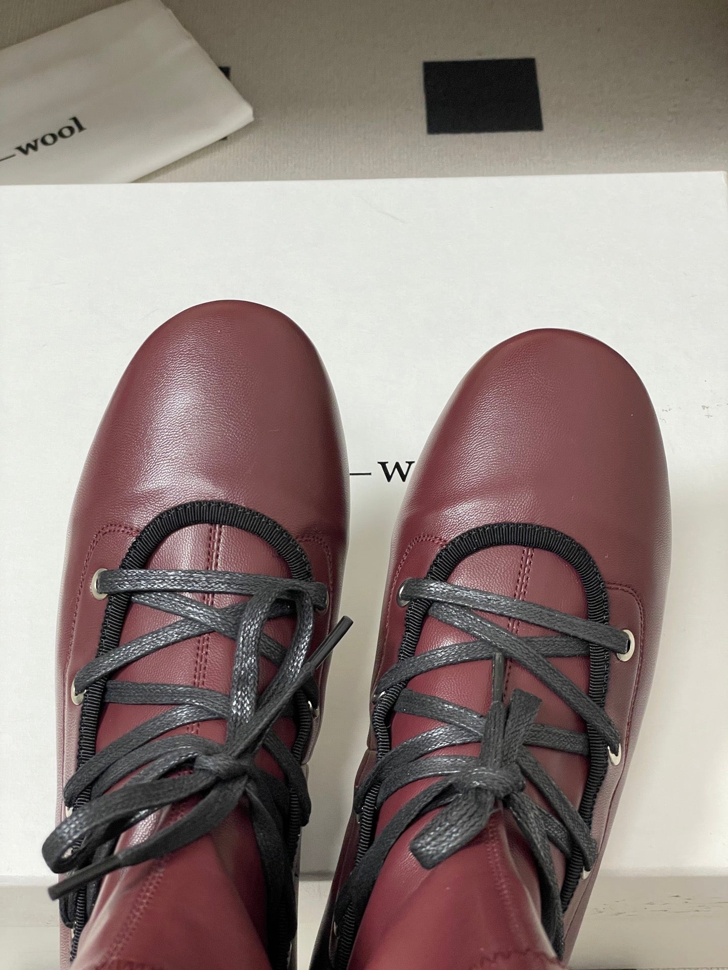 ALO 25S PALOMA WOOL FLAT ANKLE BOOTS IN DEEP RED LAMBSKIN