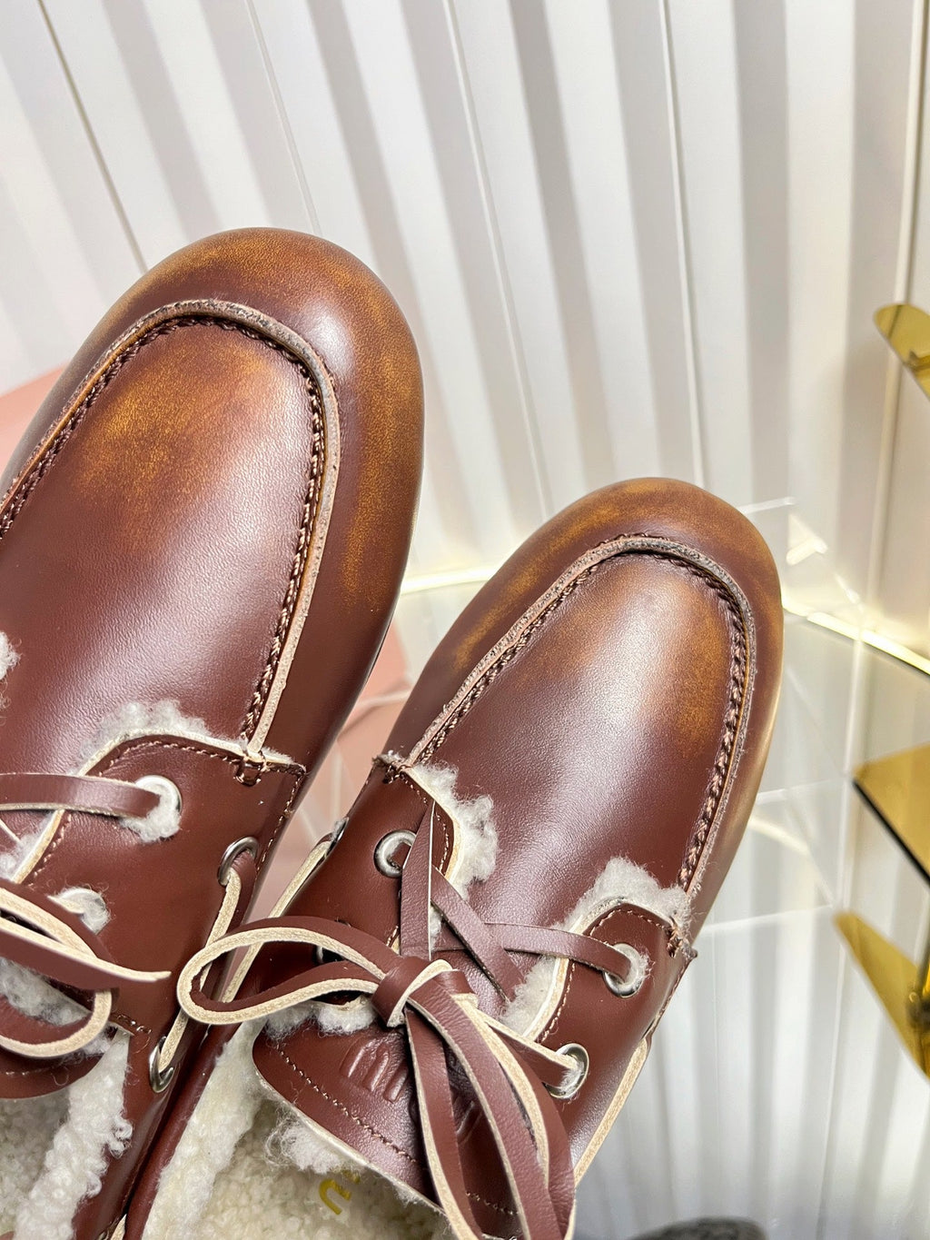 MIUMIU 26S FUR BOAT SHOES IN BROWN CALFSKIN