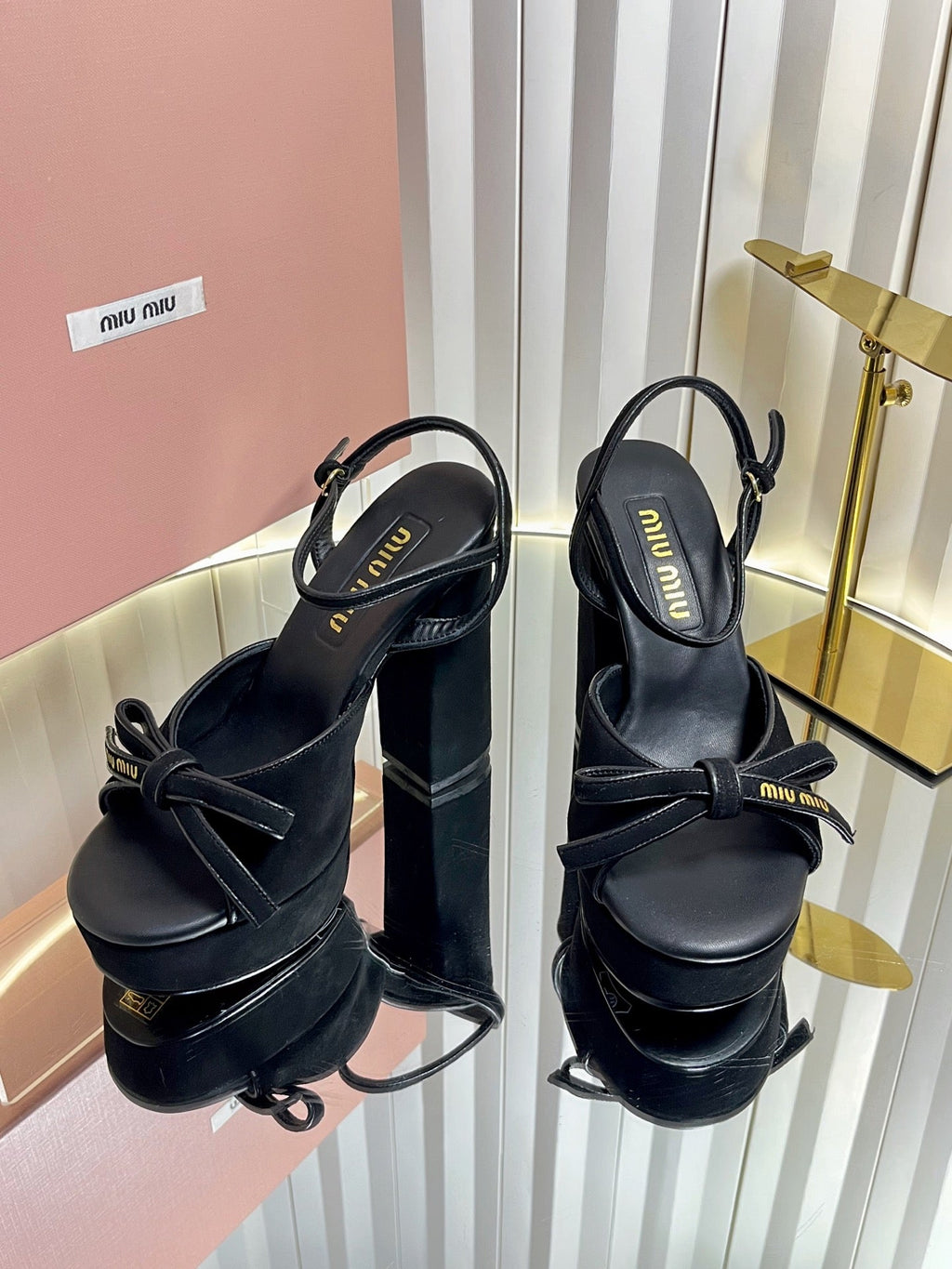 MIUMIU 26S PLATFORM ANKLE STRAP SANDALS 120MM IN BLACK SUEDE WITH BOW