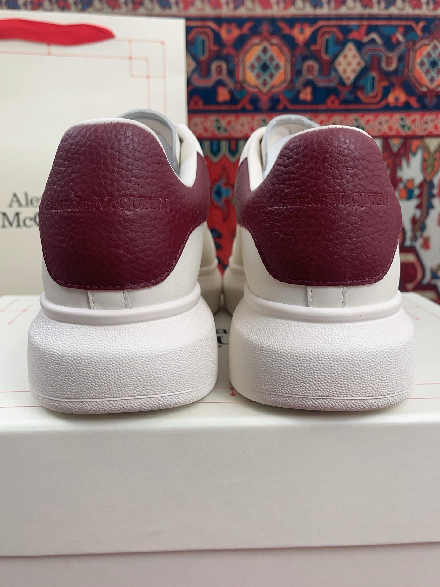 OVERSIZED SNEAKER IN WHITE CALFSKIN BURGUNDY EMBOSSED HEEL TAB