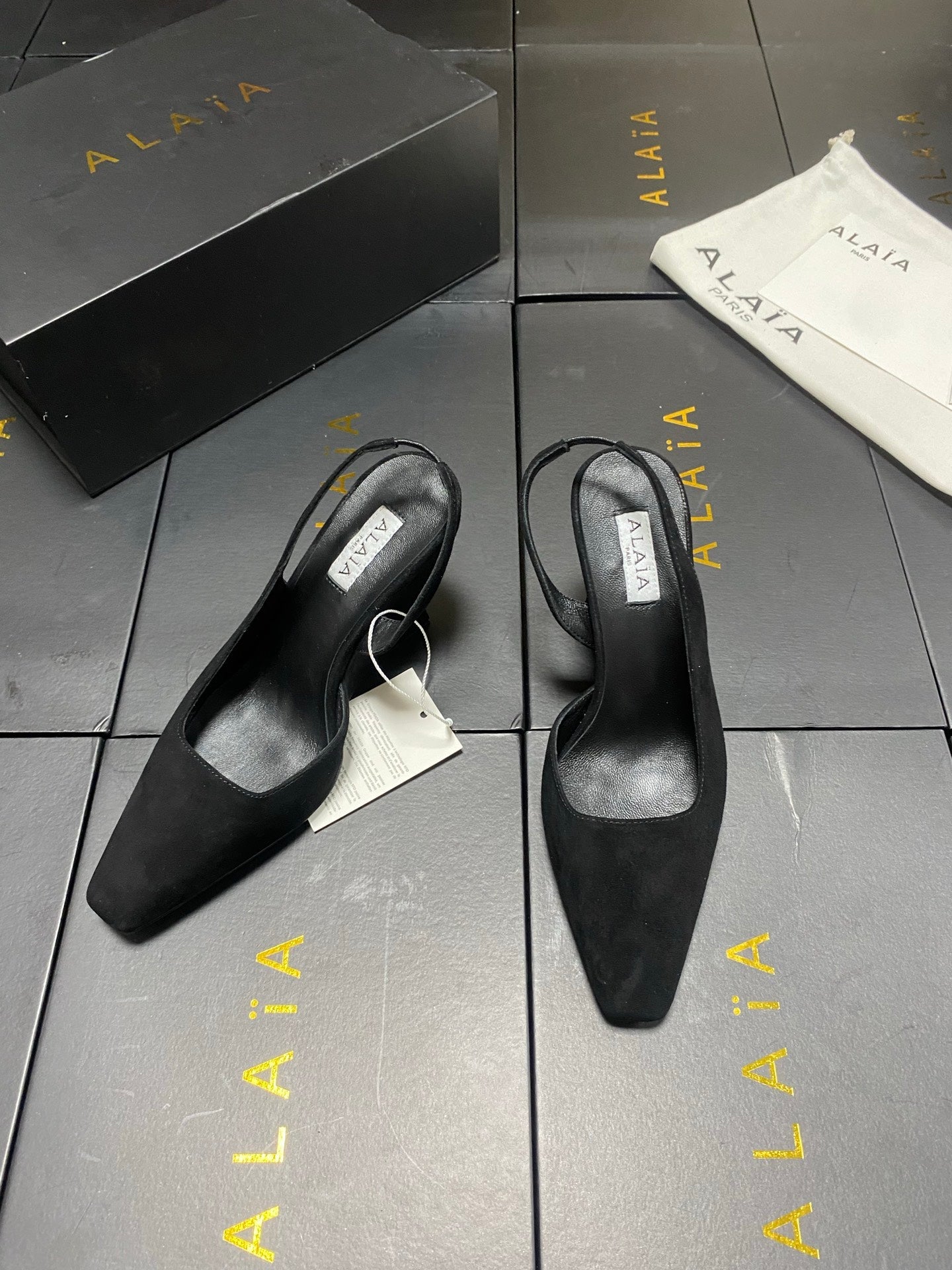 ALAIA 26S WEDGE SLINGBACKS 95 MM IN BLACK SUEDE