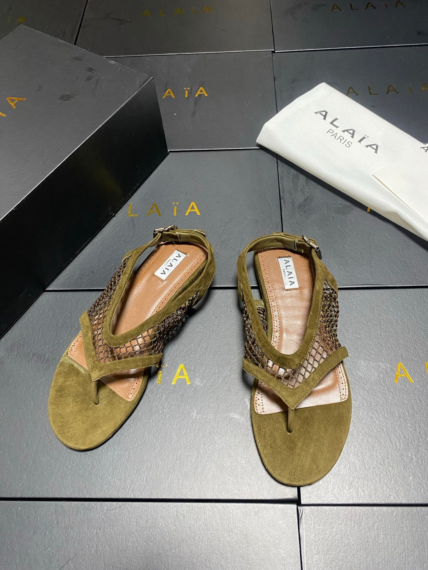 ALAIA 26S FLAT MESH THONG SANDALS MM IN MOSS GREEN SUEDE